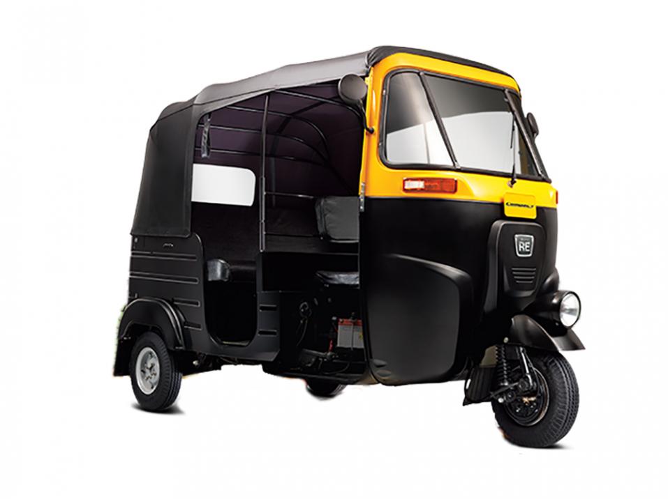 Kuvassa maailman suurimman tuktuk- eli riksataksivalmistajan, intialaisen Bajaj Auton, nelitahtinen malli.